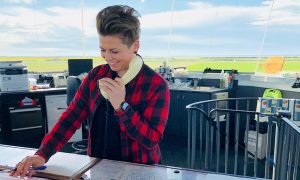 Women-In-aviation-ATC-Radio-standing-up-looking-down