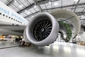 Women-in-aviation-GE9X_FTO-Engine-in-hangar-open-for-inspection